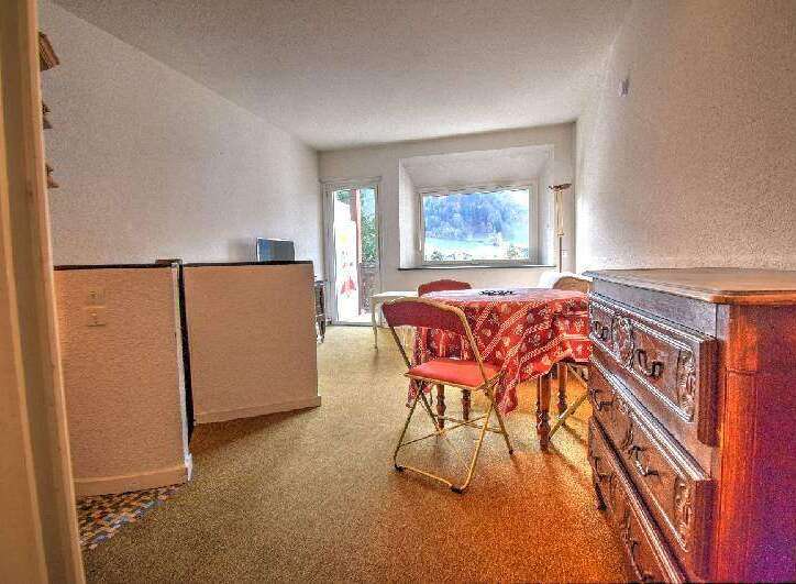 Discover this charming property featuring a cozy dining area with a beautiful view.