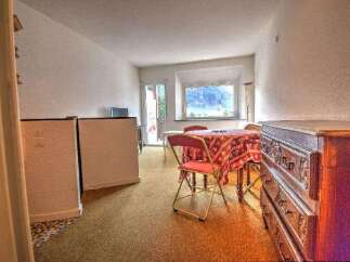Discover this charming property featuring a cozy dining area with a beautiful view.