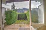 Enjoy breathtaking mountain views from this charming property.