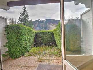 Enjoy breathtaking mountain views from this charming property.