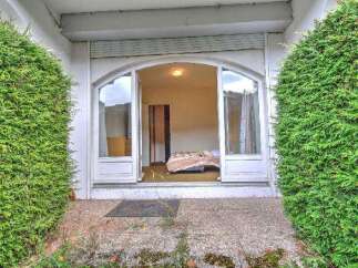 Discover a charming property with a welcoming entrance.