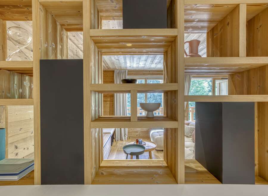 This stunning property showcases a unique architectural design with a focus on natural materials.