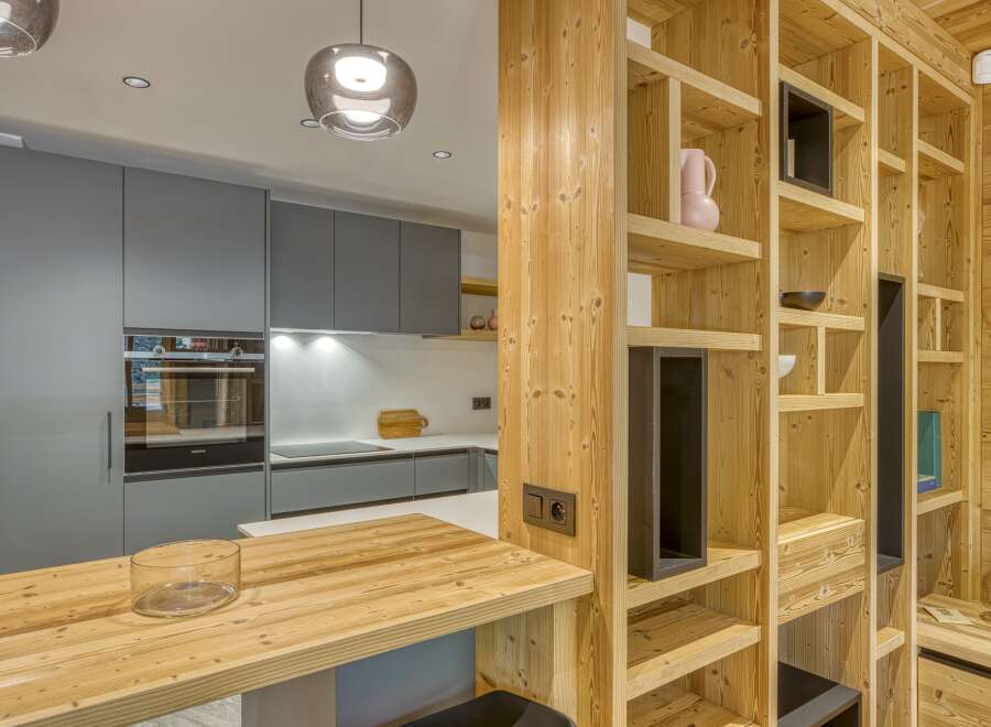 This stunning kitchen boasts a modern design with a warm, inviting feel.