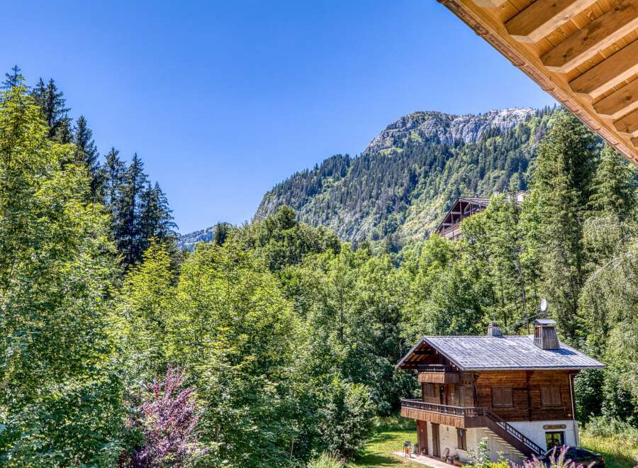 Nestled in a serene mountain setting, this charming chalet offers breathtaking views and a tranquil escape.