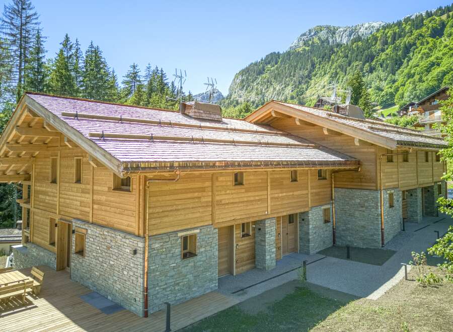 This stunning wooden chalet offers a perfect blend of rustic charm and modern comfort.