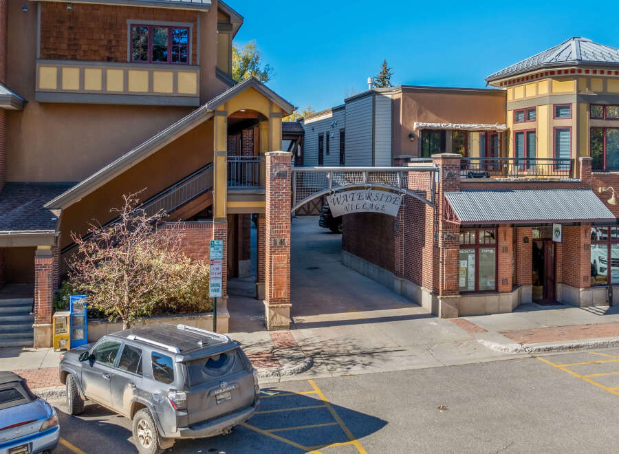 Discover the charm of Waterside Village, a unique property featuring a blend of architectural styles.