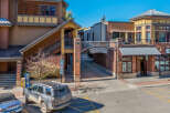 Discover the charm of Waterside Village, a unique property featuring a blend of architectural styles.