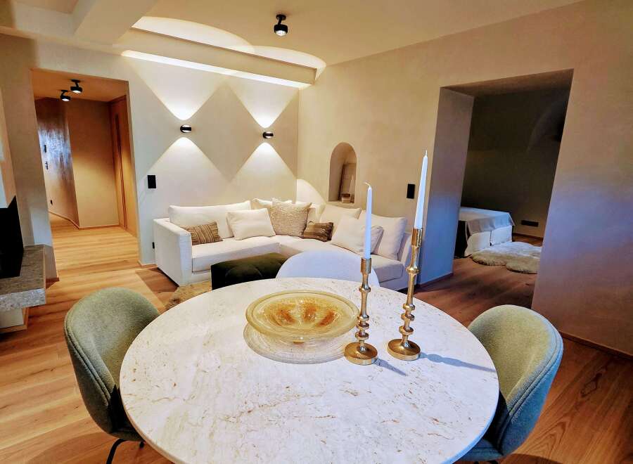 Experience luxury living in this stunning property, featuring a beautifully designed dining area.