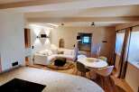 This stunning property boasts a modern open-plan living space, perfect for entertaining.