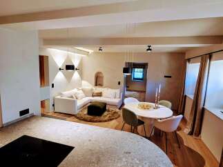 This stunning property boasts a modern open-plan living space, perfect for entertaining.