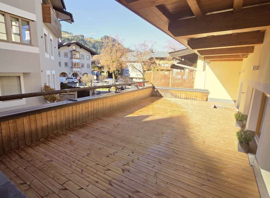 Enjoy stunning views from this beautiful wooden deck, perfect for relaxing and entertaining.