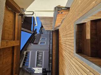 Discover the charm of this stunning property, featuring exquisite wooden accents and a modern design.