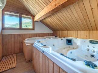Indulge in luxury and relaxation in this stunning property featuring a spa-like retreat.