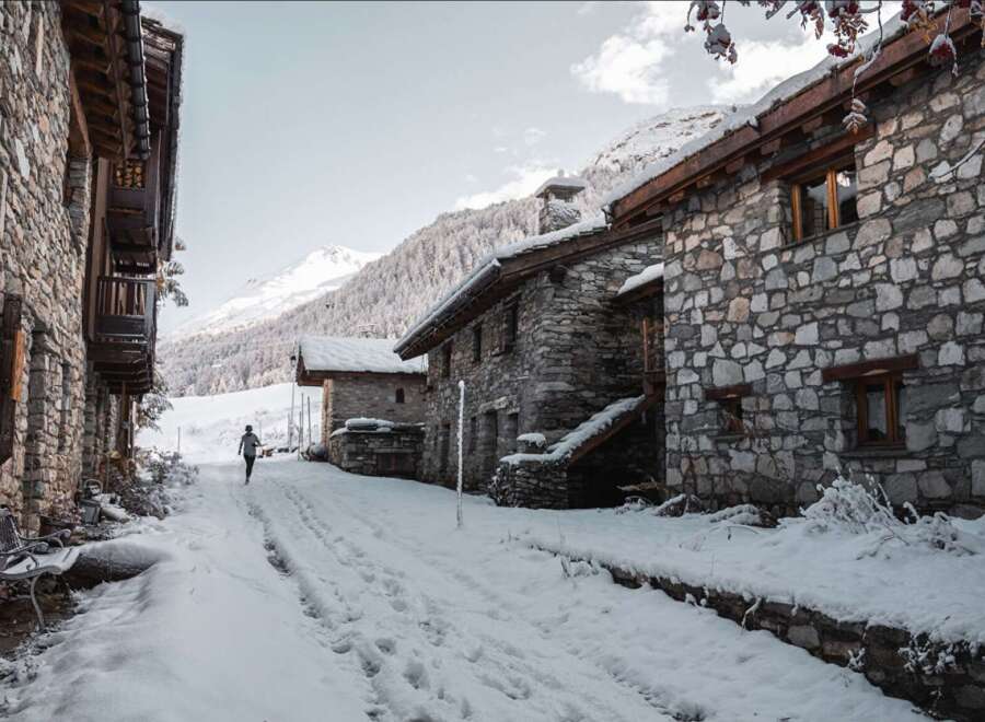 Discover the charm of this stone-built property nestled in a serene winter landscape.