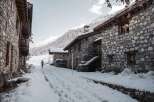 Discover the charm of this stone-built property nestled in a serene winter landscape.