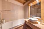 This charming bathroom features a sleek design with a modern touch.