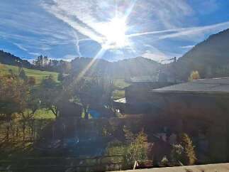 Nestled in a picturesque valley, this property offers stunning views of the surrounding mountains and lush greenery.