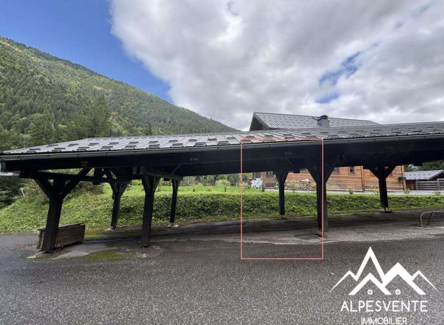 Discover this charming property featuring a covered parking area, perfect for protecting your vehicles from the elements.