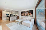 Experience luxury living in this stunning property featuring a modern open-plan kitchen and living area.