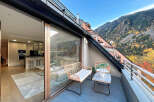 Experience luxury living with this stunning property featuring a spacious balcony and breathtaking mountain views.