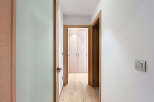 Step into a beautifully designed hallway, showcasing a seamless blend of modern aesthetics and functional design.