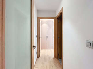 Step into a beautifully designed hallway, showcasing a seamless blend of modern aesthetics and functional design.