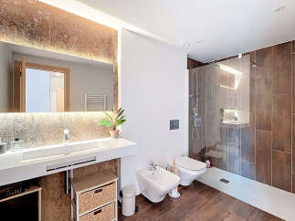 Step into luxury with this stunning bathroom! Featuring a sleek, modern design, this space boasts a spacious shower, elegant fixtures, and a stylish vanity area.