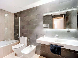Step into modern luxury with this stunning bathroom.