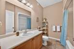 This inviting bathroom features a bright and airy design, perfect for starting your day.