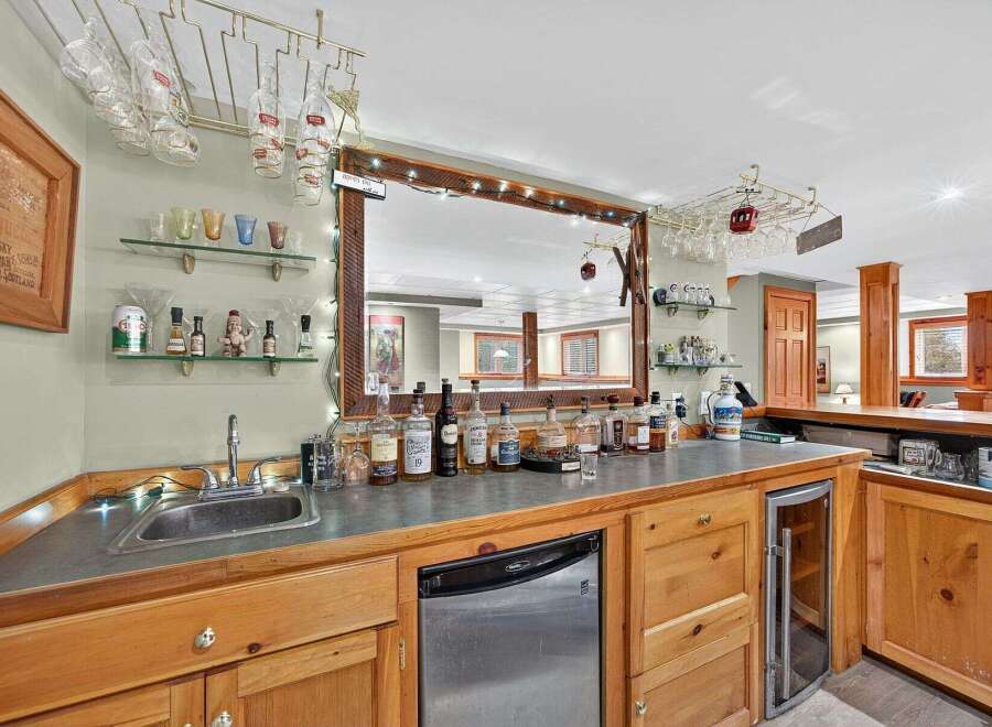 This stunning home bar is the perfect addition to any entertainment space.