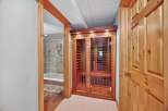Step into relaxation with this stunning property featuring a luxurious sauna and a beautifully designed shower.
