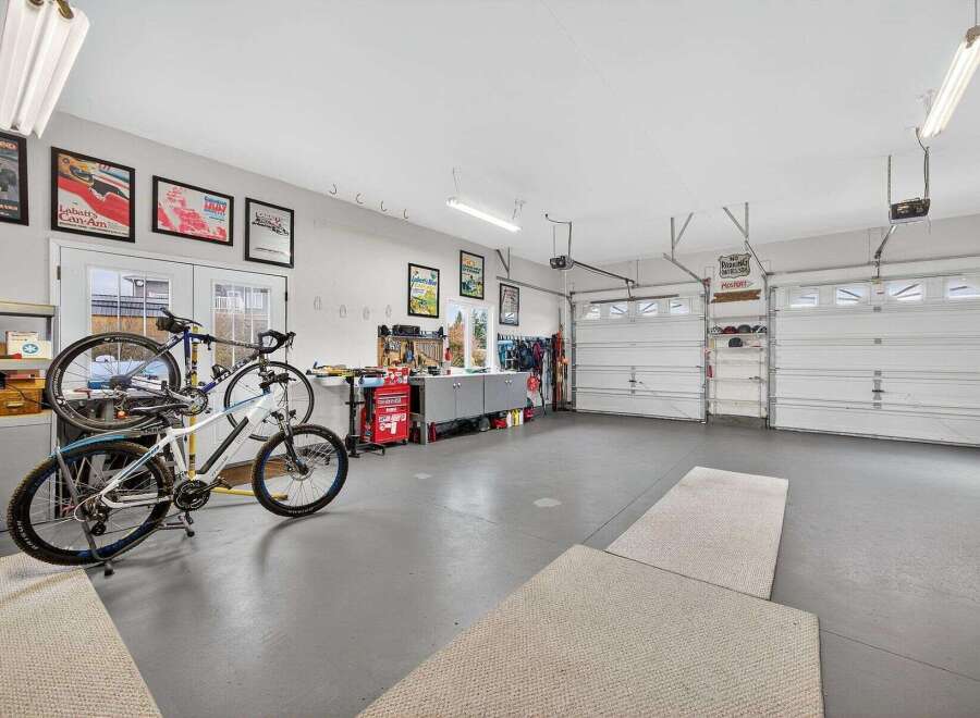 This spacious garage offers ample room for vehicles, storage, and hobbies.