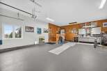 This spacious garage offers ample room for vehicles, hobbies, or storage.