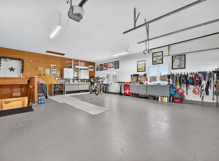 This spacious garage offers ample room for vehicles, storage, and hobbies.