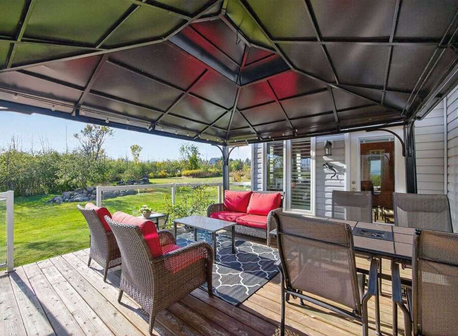 Enjoy outdoor living at its finest with this stunning patio space.