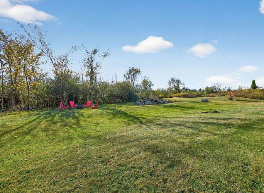 Enjoy the tranquility of this expansive property, perfect for outdoor gatherings and relaxation.