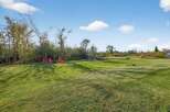 Enjoy the tranquility of this expansive property, perfect for outdoor gatherings and relaxation.