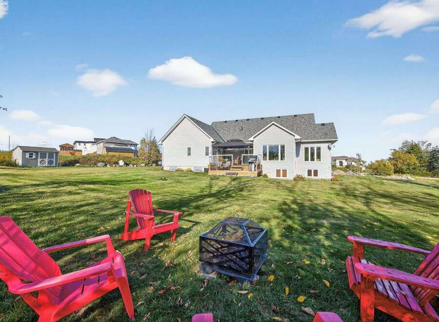 Enjoy outdoor living at its finest with this stunning property! Featuring a spacious backyard, perfect for entertaining or relaxing.