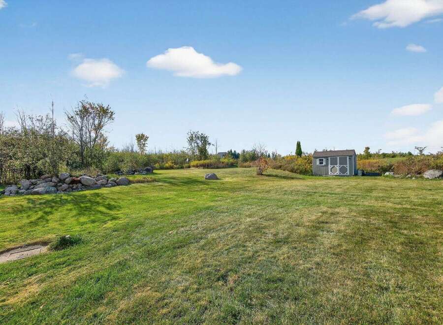 Discover the tranquility of this expansive property, perfect for outdoor enthusiasts and those seeking a peaceful retreat.