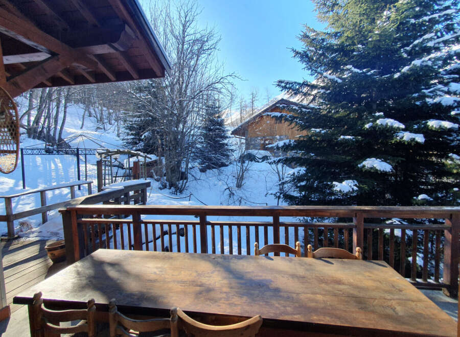Enjoy breathtaking mountain views from this charming chalet.
