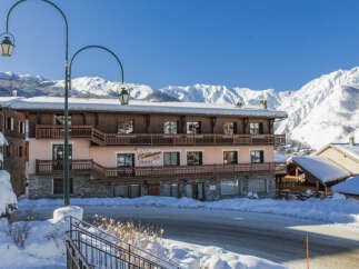 Discover the charm of this stunning chalet nestled in a picturesque winter wonderland.