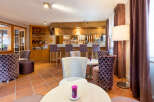Step into a cozy and inviting bar area, perfect for relaxing and socializing.
