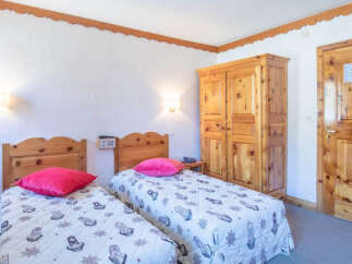 Discover a cozy and inviting bedroom perfect for a relaxing getaway.