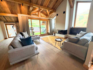 Experience luxury living in this stunning property featuring a cozy fireplace, perfect for chilly evenings.