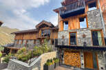 Discover the charm of this stunning mountain chalet, boasting a unique blend of stone and wood architecture.