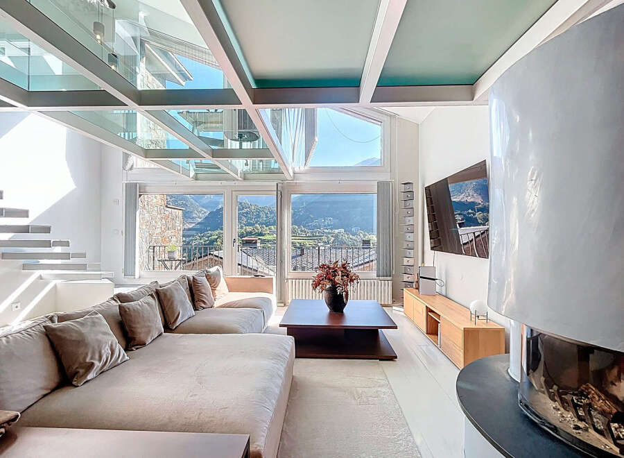 Experience luxury living in this stunning property, featuring a modern design with a glass ceiling that floods the space with natural light.