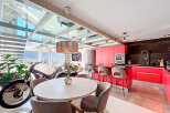 Experience luxury living in this stunning property featuring a unique glass ceiling that floods the space with natural light.