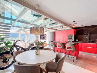 Experience luxury living in this stunning property featuring a unique glass ceiling that floods the space with natural light.