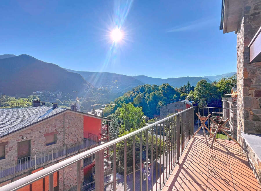 Enjoy breathtaking mountain views from this charming property.