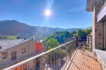 Enjoy breathtaking mountain views from this charming property.